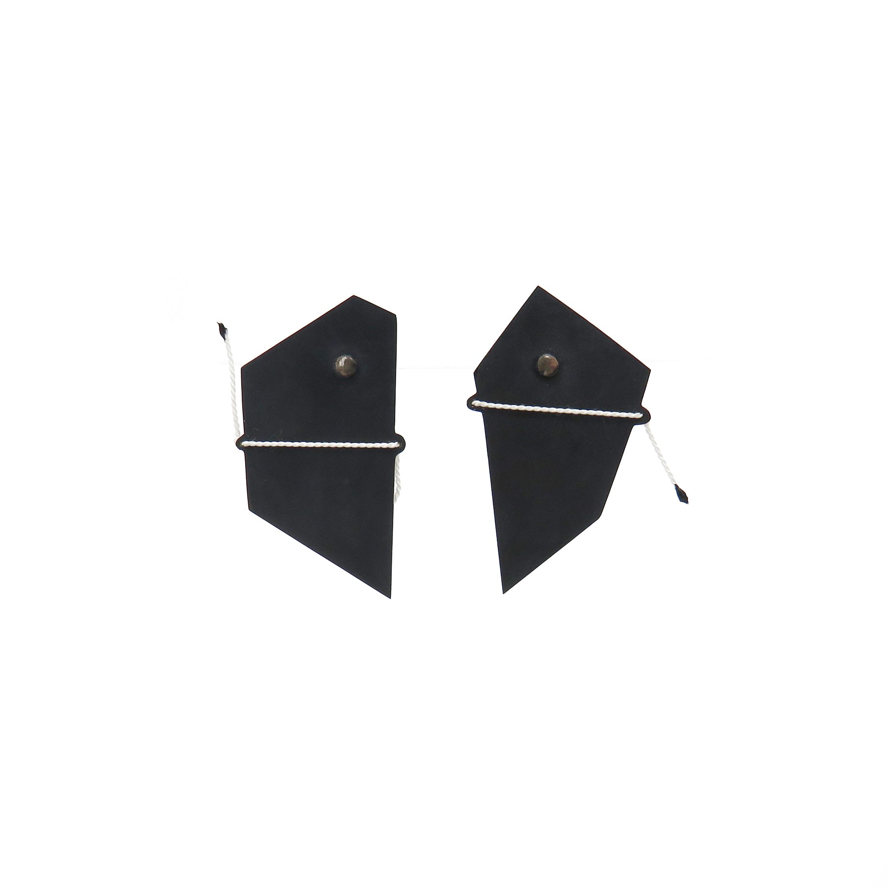 Black shadow studs with white thread